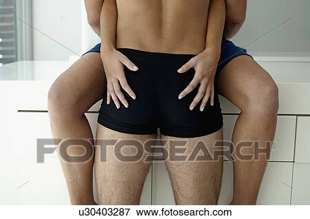 Midsection View of Young Couple Hugging View Large Photo Image Stock Photo - Midsection View of Young Couple Hugging. Fotosearch
