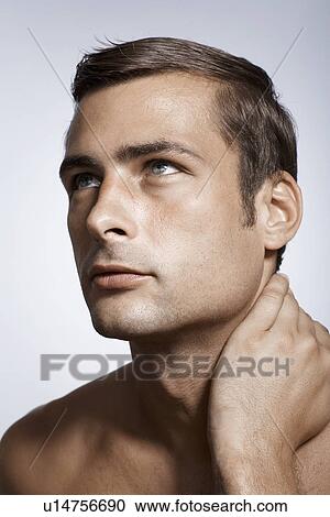 Stock Image - Portrait of mid adult man. Fotosearch