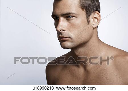 Stock Image - Portrait of mid adult man. Fotosearch