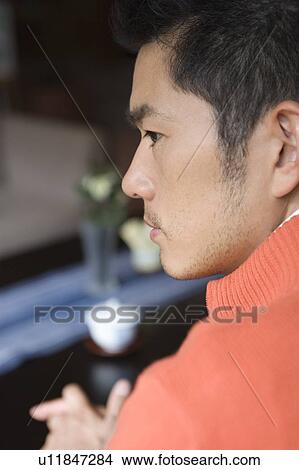 Side View of a man, differential focus, Japan View Large Photo Image Picture - Side View of a man, differential focus, Japan. Fotosearch