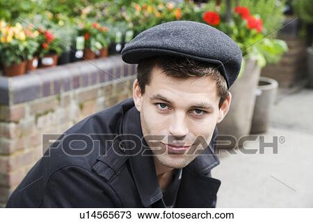 men wearing flat caps