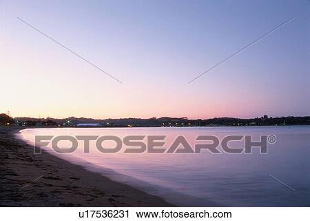 Stock Image - Beach At Sunset. Fotosearch