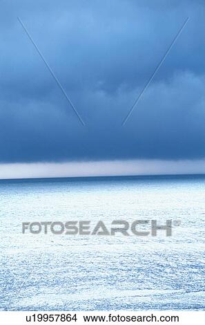 Picture - Low Clouds Above Ocean. Fotosearch