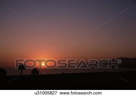 Sun Setting Over Sea View Large Photo Image Stock Photo - Sun Setting Over Sea. Fotosearch