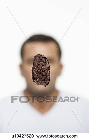 Fingerprint covering man's face View Large Photo Image Stock Image - Fingerprint covering man's face. Fotosearch