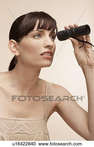 Mid adult woman using monocular View Large Photo Image Stock Image - Mid adult woman using monocular. Fotosearch