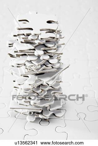 Stack of White Jigsaw Pieces  View Large Photo Image Stock Image - Stack of White Jigsaw Pieces . Fotosearch