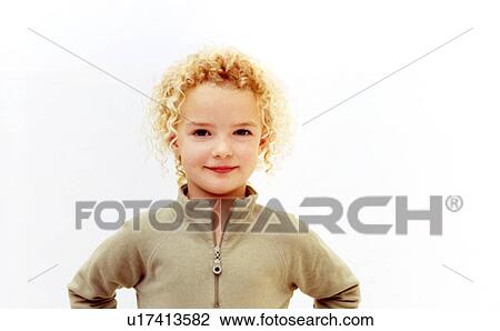 Young Girl With Curly Blonde Hair Poses Stock Image U17413582