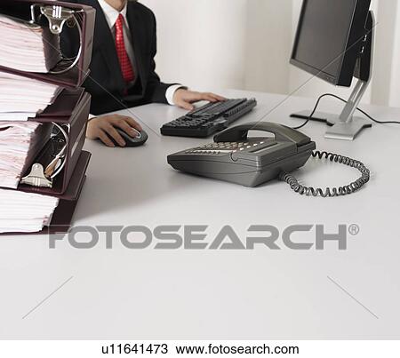 Businessman Working at Desk View Large Photo Image Stock Image - Businessman Working at Desk. Fotosearch