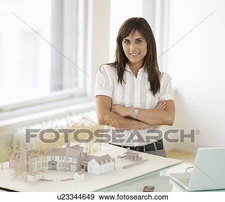 Mid-Adult Woman With Architectural Model View Large Photo Image Stock Photo - Mid-Adult Woman With Architectural Model. Fotosearch