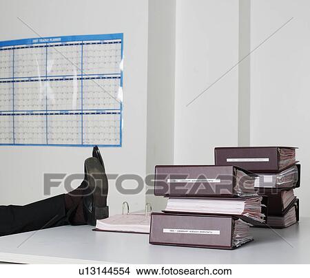 Office Worker's Legs on Desk View Large Photo Image Picture - Office Worker's Legs on Desk. Fotosearch