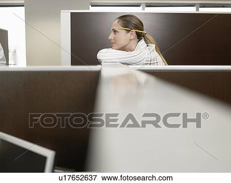 Office worker leaning against partition wall View Large Photo Image Stock Photo - Office worker leaning against partition wall. Fotosearch