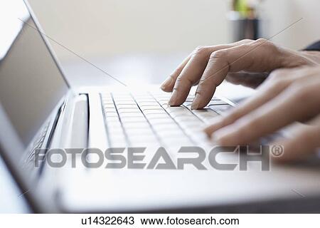 Woman's hands typing with laptop (close-up) View Large Photo Image Stock Image - Woman's hands typing with laptop (close-up). Fotosearch