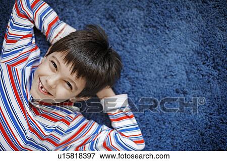 Boy Lying On Back View Large Photo Image Stock Photo - Boy Lying On Back. Fotosearch