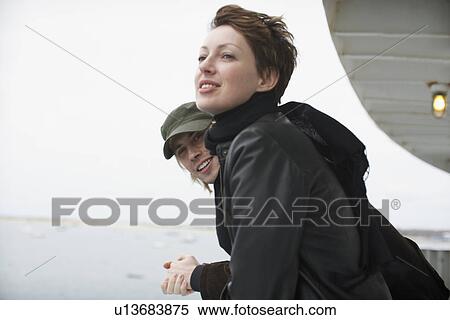 Stock Photography - Couple looking at view. Fotosearch