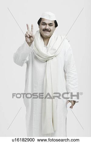 Portrait of a male politician showing a peace sign View Large Photo Image Stock Image - Portrait of a male politician showing a peace sign. Fotosearch