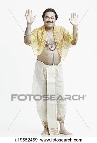 Stock Photo - Portrait of a priest giving blessings. Fotosearch