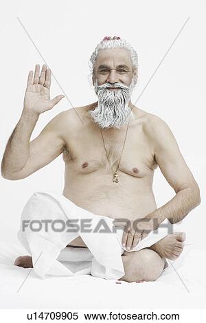 Portrait of a priest giving blessings View Large Photo Image Stock Photography - Portrait of a priest giving blessings. Fotosearch