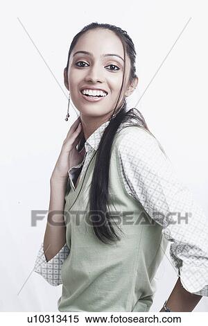 Portrait of a teenage girl smiling View Large Photo Image Stock Photography - Portrait of a teenage girl smiling. Fotosearch