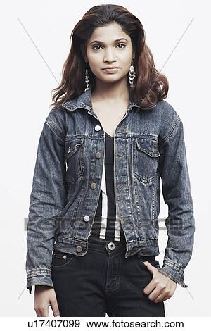 Stock Photo - Portrait of a young woman posing. Fotosearch