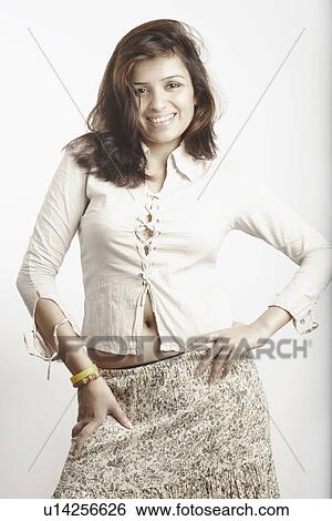 Stock Photograph - Portrait of a young woman smiling. Fotosearch