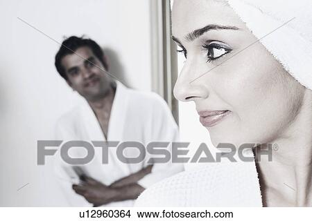 Picture - Close-up of a young woman looking sideways. Fotosearch