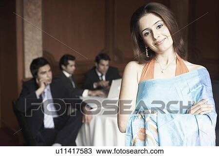 Stock Image - Portrait of a young woman smiling. Fotosearch