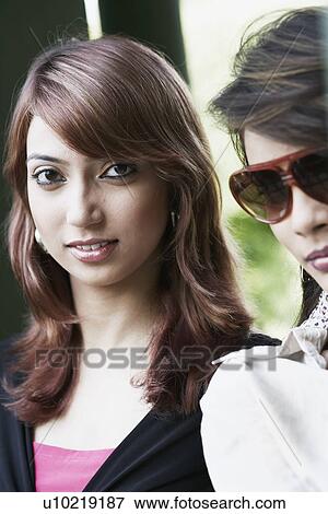 Stock Photo - Portrait of a young woman. Fotosearch