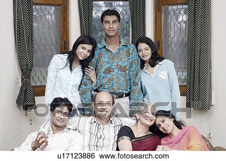 Portrait of a family smiling View Large Photo Image Stock Photograph - Portrait of a family smiling. Fotosearch