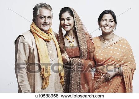 Portrait of a young woman with her parents View Large Photo Image Stock Photograph - Portrait of a young woman with her parents. Fotosearch
