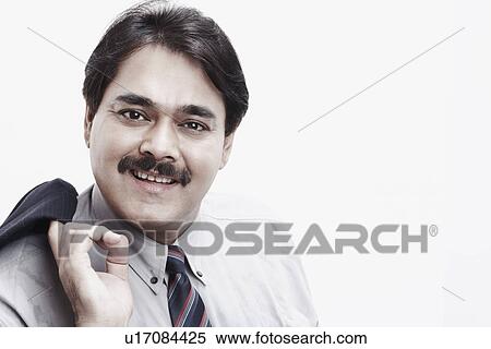 Portrait of a businessman smiling View Large Photo Image Stock Photography - Portrait of a businessman smiling. Fotosearch