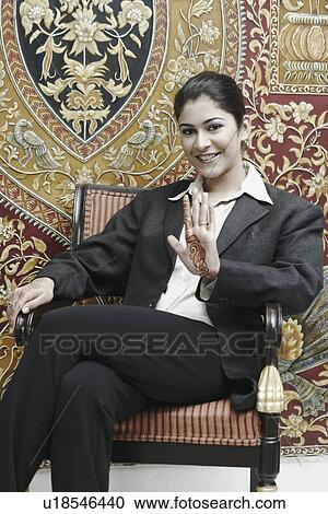 Portrait of a businesswoman smiling View Large Photo Image Stock Image - Portrait of a businesswoman smiling. Fotosearch