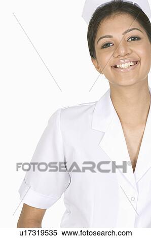 Portrait of a female nurse smiling View Large Photo Image Stock Photography - Portrait of a female nurse smiling. Fotosearch