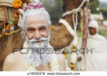 Portrait of a priest smiling View Large Photo Image Stock Photo - Portrait of a priest smiling. Fotosearch