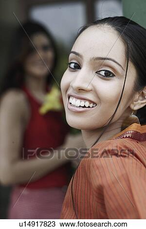 Portrait of a teenage girl smiling View Large Photo Image Stock Image - Portrait of a teenage girl smiling. Fotosearch
