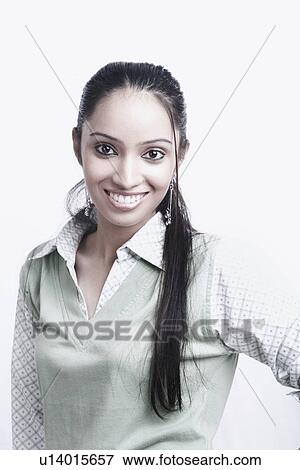 Stock Photo - Portrait of a teenage girl smiling. Fotosearch