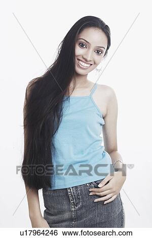 Stock Photograph - Portrait of a teenage girl smiling. Fotosearch
