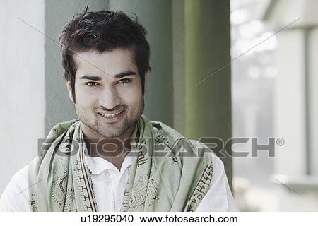 Portrait of a young man smiling View Large Photo Image Stock Image - Portrait of a young man smiling. Fotosearch