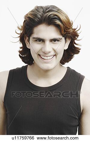 Stock Photograph - Portrait of a young man smiling. Fotosearch