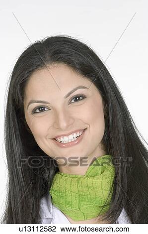 Portrait of a young woman smiling View Large Photo Image Stock Image - Portrait of a young woman smiling. Fotosearch