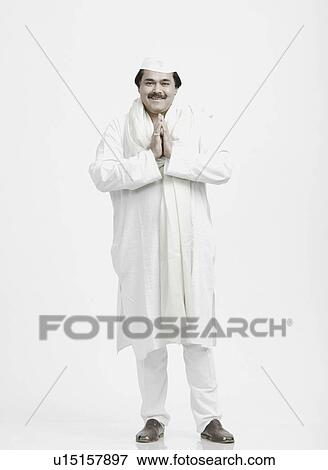 Portrait of a mature man in a prayer position View Large Photo Image Stock Photo - Portrait of a mature man in a prayer position. Fotosearch