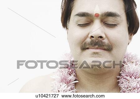 Portrait of a priest thinking with his eyes closed View Large Photo Image Stock Photo - Portrait of a priest thinking with his eyes closed. Fotosearch