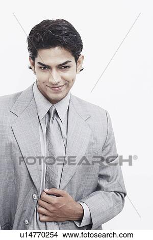 Portrait of a businessman smiling View Large Photo Image Picture - Portrait of a businessman smiling. Fotosearch