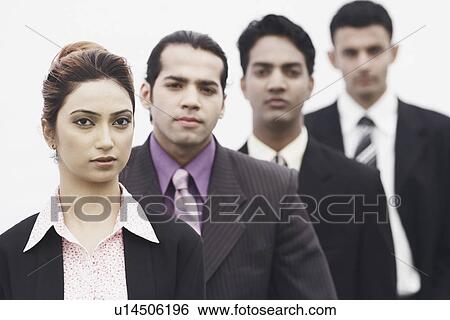 Business executives standing in a row View Large Photo Image Stock Photograph - Business executives standing in a row. Fotosearch