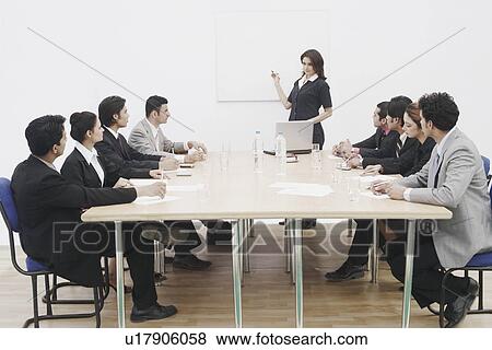 Businesswoman giving a presentation View Large Photo Image Stock Photo - Businesswoman giving a presentation. Fotosearch