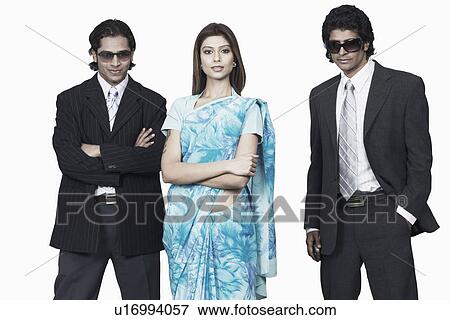Stock Photo - Portrait of a businesswoman with two businessmen. Fotosearch