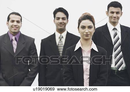 Portrait of business executives smiling View Large Photo Image Stock Photo - Portrait of business executives smiling. Fotosearch