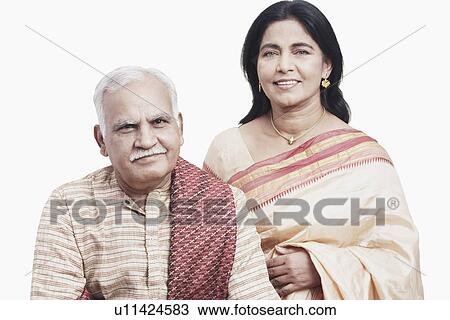 Stock Image - Portrait of a mature couple smiling. Fotosearch