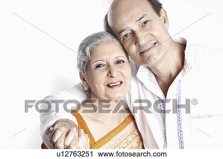 Portrait of a mature woman and a senior man View Large Photo Image Stock Image - Portrait of a mature woman and a senior man. Fotosearch