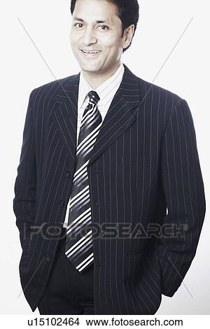 Portrait of a businessman smiling View Large Photo Image Picture - Portrait of a businessman smiling. Fotosearch